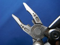 LEATHERMAN Skeletool Stainless Steel Multi-Tool, Pliers, Folding Knife, Phillips Half Serrated Blade