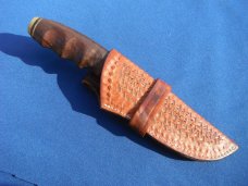 Nice Custom handmade fixed blade knife with leather sheath. A very sharp edge.