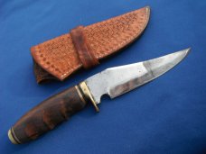 Nice Custom handmade fixed blade knife with leather sheath. A very sharp edge.