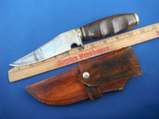 Nice Custom handmade fixed blade knife with leather sheath. A very sharp edge.