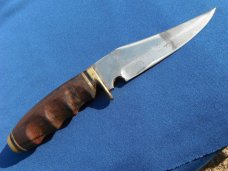 Nice Custom handmade fixed blade knife with leather sheath. A very sharp edge.