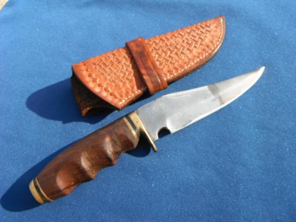 Nice Custom handmade fixed blade knife with leather sheath. A very sharp edge.