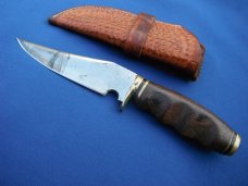 Nice Custom handmade fixed blade knife with leather sheath. A very sharp edge.