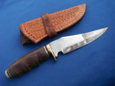 Nice Custom handmade fixed blade knife with leather sheath. A very sharp edge.