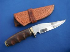 Nice Custom handmade fixed blade knife with leather sheath. A very sharp edge.