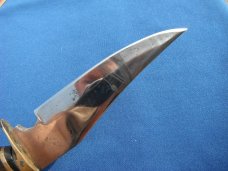 Nice Custom handmade fixed blade knife with leather sheath. A very sharp edge.