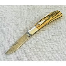 Shawn Greco Mammoth ivory and damascus Trappersmooth scales375quot perfect action