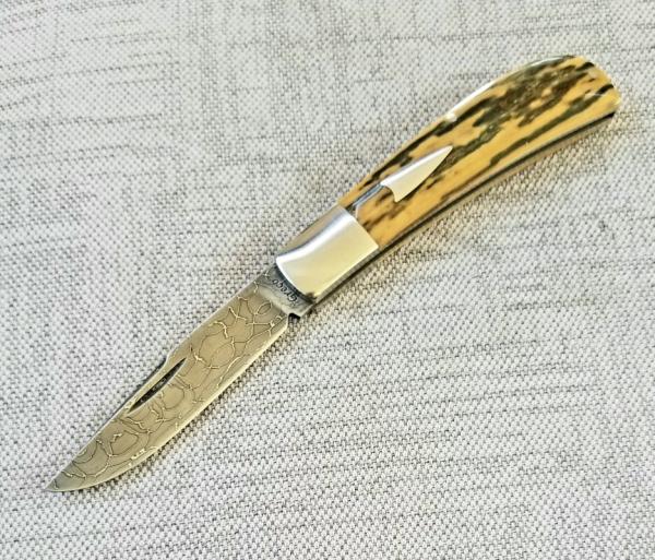 Shawn Greco Mammoth ivory and damascus Trapper...smooth scales..3.75" ..perfect action