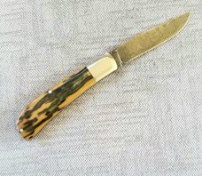 Shawn Greco Mammoth ivory and damascus Trapper...smooth scales..3.75" ..perfect action