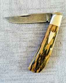 Shawn Greco Mammoth ivory and damascus Trapper...smooth scales..3.75" ..perfect action