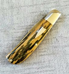 Shawn Greco Mammoth ivory and damascus Trapper...smooth scales..3.75" ..perfect action