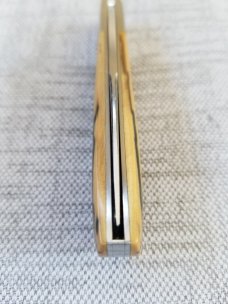 Shawn Greco Mammoth ivory and damascus Trapper...smooth scales..3.75" ..perfect action