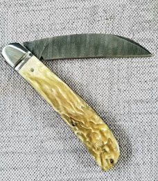 D.R.Davis Swayback Custom..Damascus...Muskox...Fileworked..Jewel liners...Black lip shield..4"