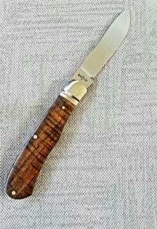Kabisch Drop Point Trapper. Exotic Koa Wood scales and 01 Tool steel..3.75" closed. Stunning piece