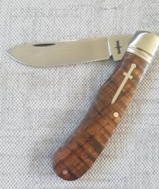 Kabisch Drop Point Trapper. Exotic Koa Wood scales and 01 Tool steel..3.75" closed. Stunning piece