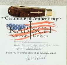 Kabisch Drop Point Trapper. Exotic Koa Wood scales and 01 Tool steel..3.75" closed. Stunning piece
