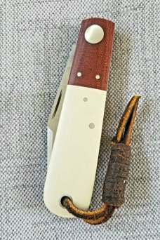 Gene Wiseman Large Clip Barlow..4.25".D2..Lanyard tube..Ivory and Natural Micarta with liners