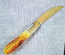 Steve Vanderkolff Mammoth Ivory,4" swayback, dot system for pulls. CPM-154, diamond shield, stout