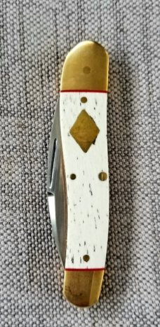 K'roo Custom Giraffe Bone Serpentine.3.5..slip..coa...rwl34..filework.red liners..spacers...brass
