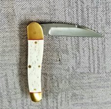 K'roo Custom Giraffe Bone Serpentine.3.5..slip..coa...rwl34..filework.red liners..spacers...brass