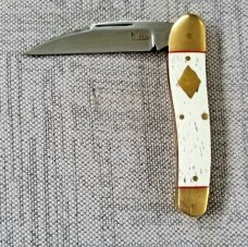 K'roo Custom Giraffe Bone Serpentine.3.5..slip..coa...rwl34..filework.red liners..spacers...brass