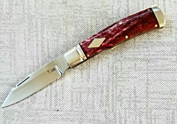 K'roo Custom Native Knife,coa/ slip, 4".Burgundy Giraffe bone..black accents..rwl34. Filework K'roo Custom Native Knife,coa/ slip, 4".Burgundy Giraffe bone..black accents..rwl34. Filework