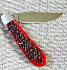 Rusty Preston Jigged bone Trapper.4 3/8" closed...Cpm154..crosshatched bolsters..coa with pouch