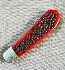 Rusty Preston Jigged bone Trapper.4 3/8" closed...Cpm154..crosshatched bolsters..coa with pouch