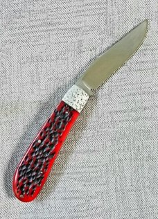 Rusty Preston Jigged bone Trapper.4 3/8" closed...Cpm154..crosshatched bolsters..coa with pouch