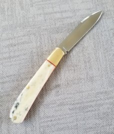 K'roo Custom Giraffe Bone and Brass Zulu..slip..coa...rwl34..filework..liners..spacers..shield