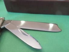Case XX 1987 Raised Letter Case Shield, Red Bone One Arm Man's Pattern # 6205 SSP