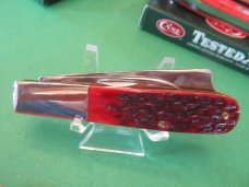 Case XX 1987 Raised Letter Case Shield, Red Bone One Arm Man's Pattern # 6205 SSP