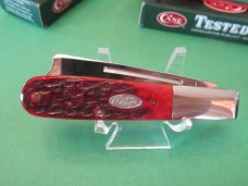 Case XX 1987 Raised Letter Case Shield, Red Bone One Arm Man's Pattern # 6205 SSP