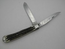 Queen Cutlery #19 Trapper Winterbottom bone with Glazed Finished Blades: 4 1/8” closed,