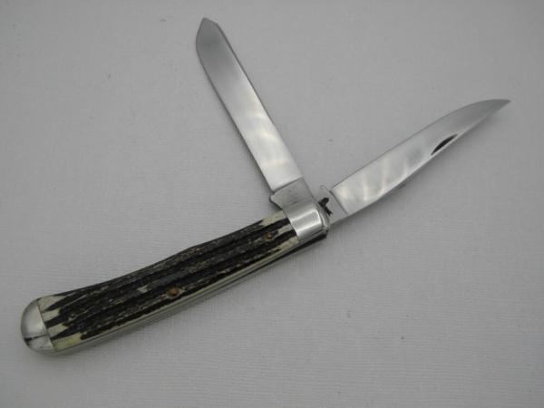 Queen Cutlery #19  Trapper Winterbottom bone with Glazed Finished Blades:  4 1/8” closed,