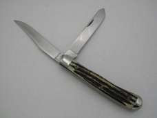 Queen Cutlery #19  Trapper Winterbottom bone with Glazed Finished Blades:  4 1/8” closed,