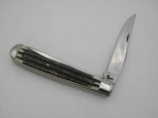 Queen Cutlery #19  Trapper Winterbottom bone with Glazed Finished Blades:  4 1/8” closed,