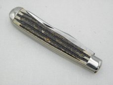 Queen Cutlery #19  Trapper Winterbottom bone with Glazed Finished Blades:  4 1/8” closed,