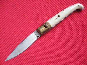 Vintage Italian Indiana Engraved Bolster Button Open/Close Knife.