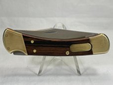 2005 BUCK USA 110 Wood Automatic Folding Hunter Lockback MINT IN POUCH 