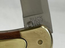 2003 BUCK USA 110 Wood Automatic Folding Hunter Lockback MINT IN POUCH 