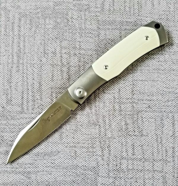 Viper Hug..Sacha Thiel Collab...Ivory G10..M390..4" closed...bolsters and caps w/tube...Leather slip Viper Hug..Sacha Thiel Collab...Ivory G10..M390..4" closed...bolsters and caps w/tube...Leather slip