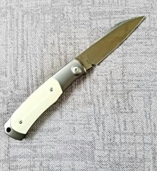 Viper Hug..Sacha Thiel Collab...Ivory G10..M390..4" closed...bolsters and caps w/tube...Leather slip