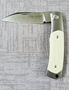 Viper Hug..Sacha Thiel Collab...Ivory G10..M390..4" closed...bolsters and caps w/tube...Leather slip