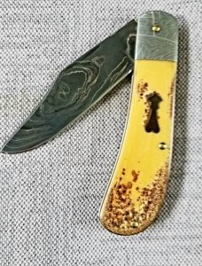 Sacred Bear/Tory Utt Lanny His  Damascus blade,shield and bolsters,Torched Paper Micarta..4" closed