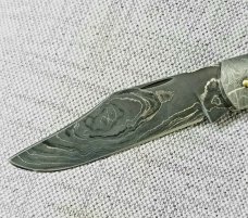Sacred Bear/Tory Utt Lanny His  Damascus blade,shield and bolsters,Torched Paper Micarta..4" closed