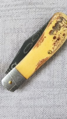 Sacred Bear/Tory Utt Lanny His  Damascus blade,shield and bolsters,Torched Paper Micarta..4" closed