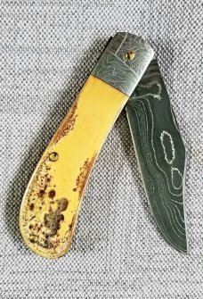 Sacred Bear/Tory Utt Lanny His  Damascus blade,shield and bolsters,Torched Paper Micarta..4" closed