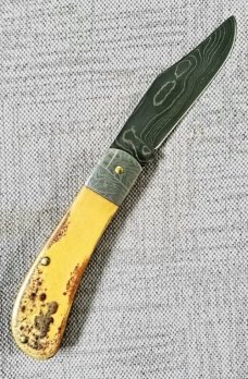 Sacred Bear/Tory Utt Lanny His  Damascus blade,shield and bolsters,Torched Paper Micarta..4" closed