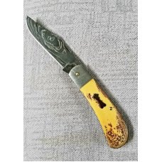 Sacred BearTory Utt Lanny His Damascus bladeshield and bolstersTorched Paper Micarta4quot closed